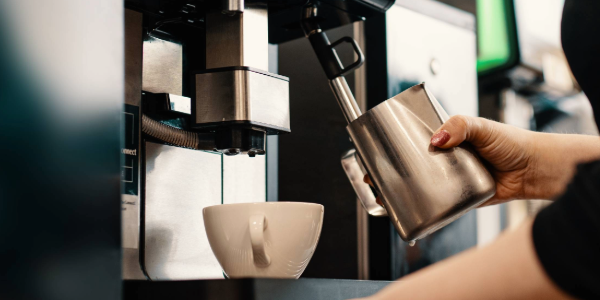 Steaming latte milk on the WMF 5000+ coffee machine