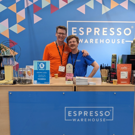 Espresso Warehouse and Suki Tea employees standing side by side 