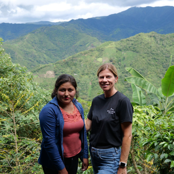 Fairtrade farmer with Matthew Algie employee