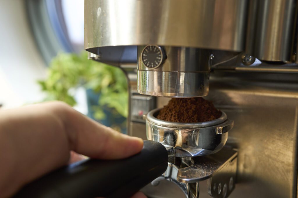 Coffee being tamped